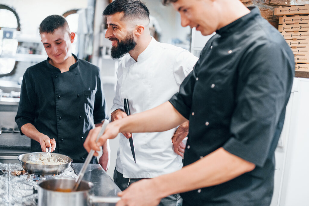 Chefs working in a restaurant kitchen in Croatia